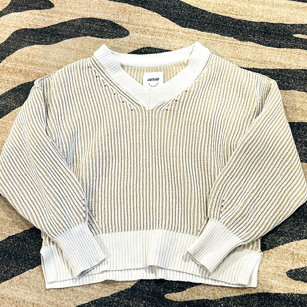 This is a cream white brown sweater from
Aerie.